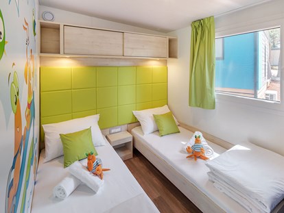 Luxuscamping - TV - Tar - Lanterna Premium Camping Resort - Meinmobilheim Maro Premium auf dem Lanterna Premium Camping Resort