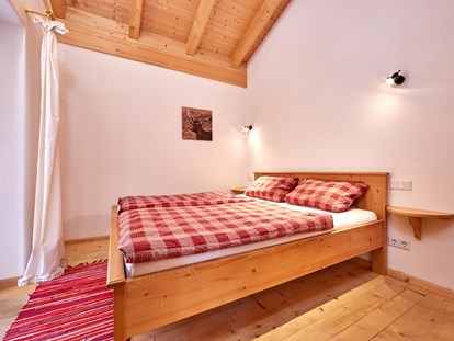 Luxury camping - Tiroler Oberland - Schlafzimmer - Camping Resort Zugspitze Berghütten Premium im Camping Resort Zugspitze
