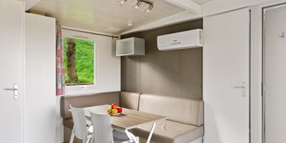 Luxuscamping - WC - Gardasee - Camping Eden - Vacanceselect Mobilheim Moda 5/7 Pers 2 Zimmer AC mit Aussicht von Vacanceselect auf Camping Eden