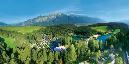 Luxuscamping - Kochutensilien - Tirol - Ferienparadies Natterer See - Nature Resort Natterer See Safari-Lodge-Zelt "Rhino" am Nature Resort Natterer See