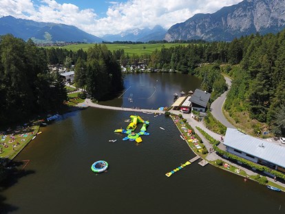 Luxuscamping - Terrasse - Österreich - Mega-Aqua Park - Nature Resort Natterer See Wood-Lodges am Nature Resort Natterer See