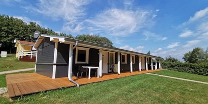 Luxuscamping - WC - Ostseeküste - Jeder Bungalow mit eigener Terrasse - ostseequelle.camp Bungalows für 4 Personen
