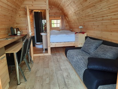 Luxuscamping - Terrasse - Schleswig-Holstein - Premium Pod mit Duschbad - Nord-Ostsee Camp Nord-Ostsee Camp Premium Camping Pod