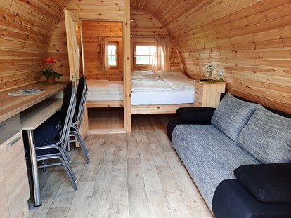 Luxury camping - Terrasse - Pod mit Kinderzimmer Matratze 1,40m x 1,40 m - Campotel Nord-Ostsee Camping Pod