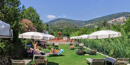 Luxuscamping - Kochmöglichkeit - Ligurien - Campingplatz-Solarium - Camping dei Fiori  Mobilheim Superior Next auf Camping dei Fiori 