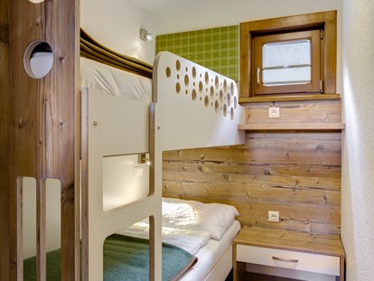 Luxury camping - getrennte Schlafbereiche - Chalet Kinderzimmer - Camping Brunner am See Chalets auf Camping Brunner am See