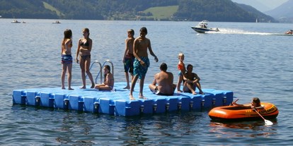 Luxuscamping - Terrasse - Kärnten - Schwimmplattform Camping Brunner - Camping Brunner am See Chalets auf Camping Brunner am See
