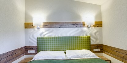 Luxuscamping - Kochmöglichkeit - Chalet Schlafzimmer - Camping Brunner am See Chalets auf Camping Brunner am See