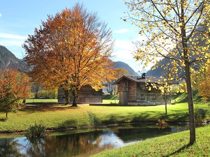Luxuscamping - Art der Unterkunft: Bungalow - Österreich - Herbst im Almdorf Grubhof im Salzburger Land - Grubhof Almhütte Almberg Alm im Almdorf Grubhof