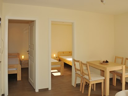 Luxuscamping - Restaurant - Deutschland - Ferienhäuser von innen - Camping Stover Strand