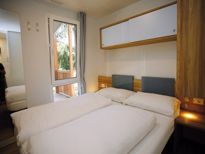 Luxuscamping - Umgebungsschwerpunkt: See - Schlafzimmer SeeLodge - Seecamping Hoffmann