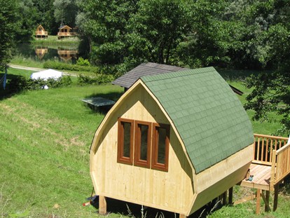 Luxuscamping - Preisniveau: günstig - Österreich - alle neuen Hütten mit Terrasse - Camping Au an der Donau Hütten auf Camping Au an der Donau