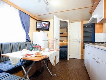Luxury camping - getrennte Schlafbereiche - Cavallino-Treporti - Ess- und Kochbereich - Camping Vela Blu Mobilheim Top Residence Gold am Camping Vela Blu