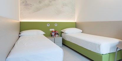 Luxuscamping - Cavallino-Treporti - Schlafzimmer mit Einzelbetten - Camping Vela Blu Residence Aurora auf Camping Vela Blu