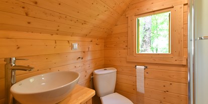 Luxuscamping - Terrasse - Pleinfeld - Bad mit WC und Dusche im Family-Troll - Waldcamping Brombach Family Troll am Waldcamping Brombach