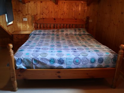 Luxury camping - Mailand - Doppelbett im Bungalow auf Camping Montorfano  - Camping Montorfano Bungalows
