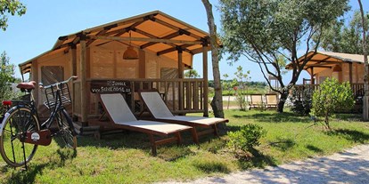 Luxuscamping - Terrasse - Venedig - Sunlodge Jungle Zelt - Camping Village Cavallino - Suncamp SunLodge Jungle von Suncamp auf Camping Village Cavallino