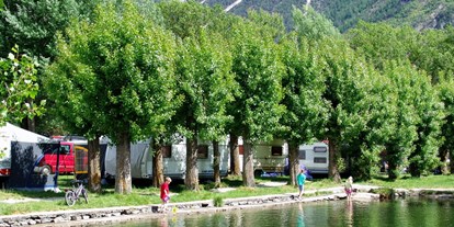 Luxuscamping - Terrasse - Wallis - Direkt am Wasser - Camping Swiss-Plage Chalet am Camping Swiss-Plage