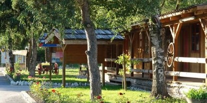 Luxuscamping - Terrasse - Wallis - Idyllisch in der Natur gelegen - Camping Swiss-Plage Chalet am Camping Swiss-Plage