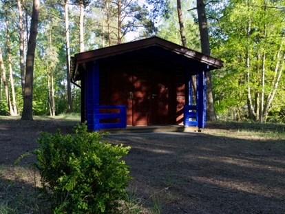 Luxury camping - Terrasse - Naturcampingpark Rehberge Radhütte Radieschen am Wurlsee - Naturcampingpark Rehberge