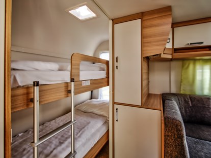 Luxury camping - Preisniveau: moderat - Germany - Das Etagenbett für die Kinder. - Camping- und Ferienpark Wulfener Hals Mietwohnwagen Kat. 0+ am Camping- und Ferienpark Wulfener Hals