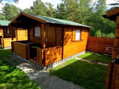 Luxury camping - Terrasse - Germany - Campingpl. NATURCAMP Pruchten Blockhütten