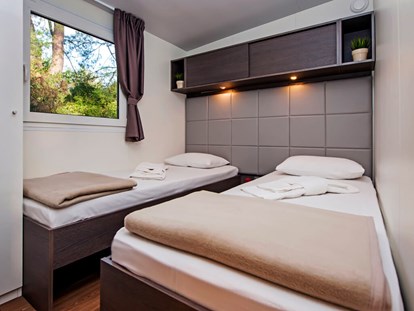 Luxury camping - TV - Rovinj - Campingplatz Porton Biondi - Meinmobilheim Mediteran Superior auf dem Campingplatz Porton Biondi
