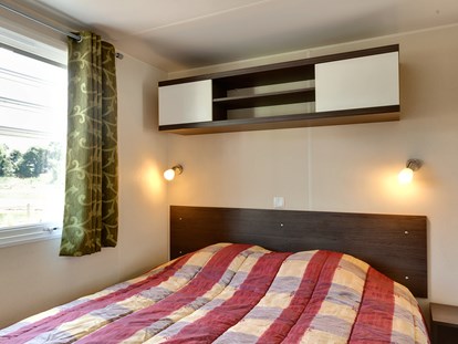 Luxuscamping - Preisniveau: exklusiv - Charente-Maritime - Schlafzimmer Cottage VIP Loft 6, Camping Séquoia Parc - Séquoia Parc Cottage VIP Loft 6 auf Séquoia Parc