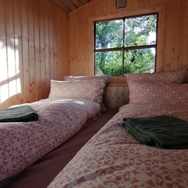 Glampingunterkunft: Bett im Kohlmeischen, Bett:160x200 cm - Bauwagen Lodge