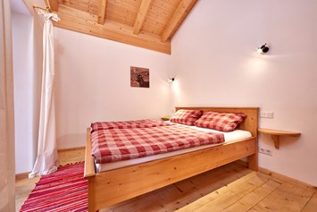 Glampingunterkunft: Schlafzimmer - Berghütten Premium im Camping Resort Zugspitze