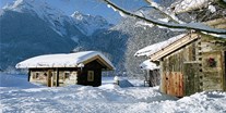 Luxuscamping - WC - Tiroler Unterland - Wintertraum im Almdorf Grubhof - Grubhof Almhütte Almberg Alm im Almdorf Grubhof