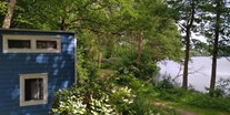 Luxuscamping - Seenplatte - Naturcampingpark Rehberge Tiny House Nala am Wurlsee - Naturcampingpark Rehberge