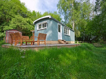 Luxuscamping - Tiny House Erlis direkt am Wurlsee - Tiny House am See - Naturcampingpark Rehberge