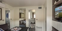 Luxuscamping - Istrien - Campingplatz Porton Biondi - Meinmobilheim Mediteran Premium Seaview auf dem Campingplatz Porton Biondi