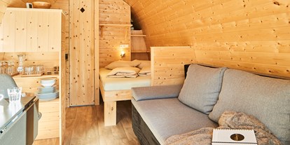 Luxuscamping - TV - PLZ 6531 (Österreich) - Camping Dreiländereck in Tirol Woodlodges Tannen- und Fichtenhütte