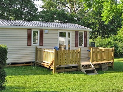 Luxuscamping - Mosel / Müllerthal / Grevenmacher - Estiva Mobilheim Park Neumuhle Luxemburg. - Camping Neumuehle Muellerthal Estiva MobilHeim Glamping Neumuhle Luxemburg. 4 Pers. 2 Schlaffzimmer. Douche. Wc.