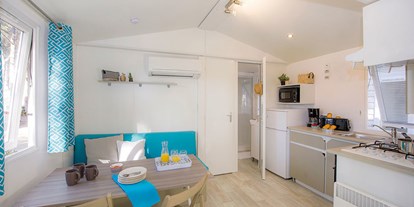 Luxuscamping - Preisniveau: exklusiv - Camping Les Vignes - Vacanceselect Mobilheim Premium 4 Personen 2 Zimmer von Vacanceselect auf Camping Les Vignes