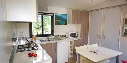 Luxuscamping - Kochmöglichkeit - Italien - Union Lido - Vacanceselect Mobilheim Moda 4/5 Personen 2 Zimmer Klimaanlage von Vacanceselect auf Camping Union Lido