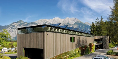Luxury camping - Preisniveau: exklusiv - Austria - Ultramodernes Multifunktionsgebäude - Nature Resort Natterer See Safari-Lodge-Zelt "Rhino" am Nature Resort Natterer See