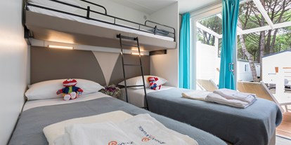 Luxuscamping - getrennte Schlafbereiche - Cavallino - Kinderbettzimmer - Camping Ca' Pasquali Village Mobilheim Laguna Platinum auf Camping Ca' Pasquali Village