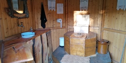 Luxuscamping - Art der Unterkunft: spezielle Unterkunft - PLZ 35216 (Deutschland) - Naturbadezimmer mit Kompost-Trenntoilette - Ecolodge Hinterland Western Lodge