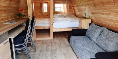 Luxuscamping - Heizung - Binnenland - Pod mit Kinderzimmer Matratze 1,40m x 1,40 m - Nord-Ostsee Camp Nord-Ostsee Camp Camping Pod