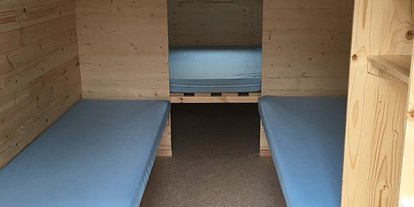 Luxuscamping - Art der Unterkunft: Hütte/POD - PLZ 78315 (Deutschland) - Campingplatz Markelfingen Schlaf-Häusle auf dem Campingplatz Markelfingen
