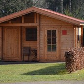 Luxuscamping: Hütte Rot  - Camping Zum Oertzewinkel: Hütten auf Camping Zum Oertzewinkel