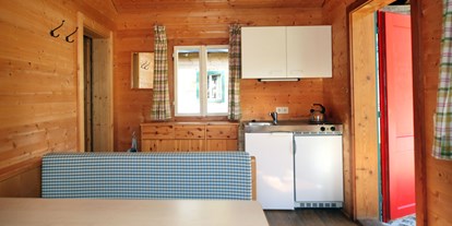 Luxuscamping - Gartenmöbel - PLZ 5092 (Österreich) - aus Holz, in einfacher Ausstattung - Grubhof Campinghäuschen auf Grubhof