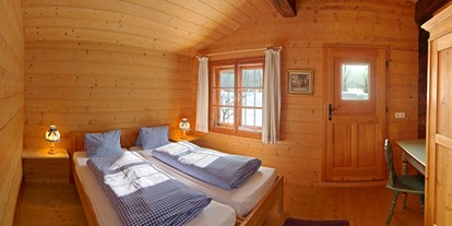 Luxuscamping - Art der Unterkunft: Bungalow - Pinzgau - kuscheliges Schlafzimmer Scheffsnother Stube - Grubhof Almhütte Scheffsnother Stube im Almdorf Grubhof