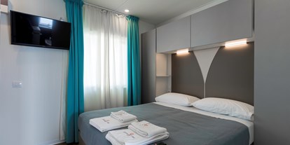 Luxuscamping - getrennte Schlafbereiche - Cavallino - Doppelzimmer - Camping Ca' Pasquali Village Mobilheim Venice Platinum auf Camping Ca' Pasquali Village