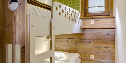 Luxuscamping - Umgebungsschwerpunkt: See - Chalet Kinderzimmer - Camping Brunner am See