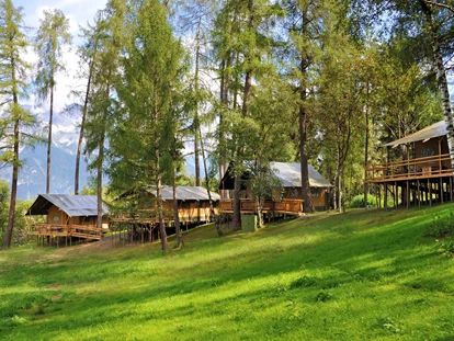 Luxuscamping - Lagerfeuerplatz - Österreich - Safari-Lodge-Zelte - Nature Resort Natterer See