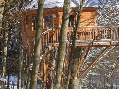 Luxuscamping - im Winter geöffnet - Hessen Süd - Auch im Winter kuschelig: alle Baumhäuser sind beheizbar - Baumhaushotel Seemühle